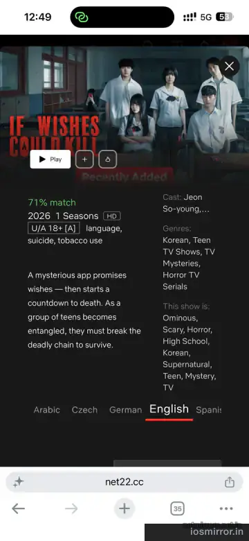 Movie detail page on iPhone Safari with audio language picker and big Play button